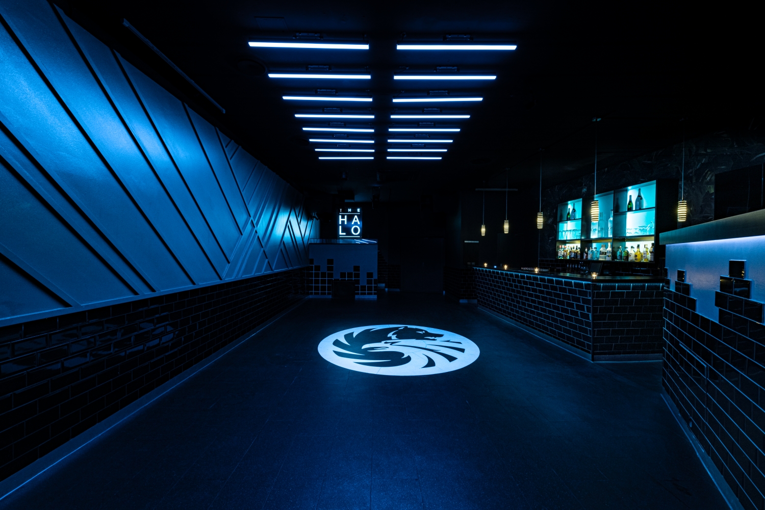 UPPER HALO Bar and Dancefloor with urban design elements such as bricks and some nice contemporary patterns on the walls add nice detail to the hip-hop area.