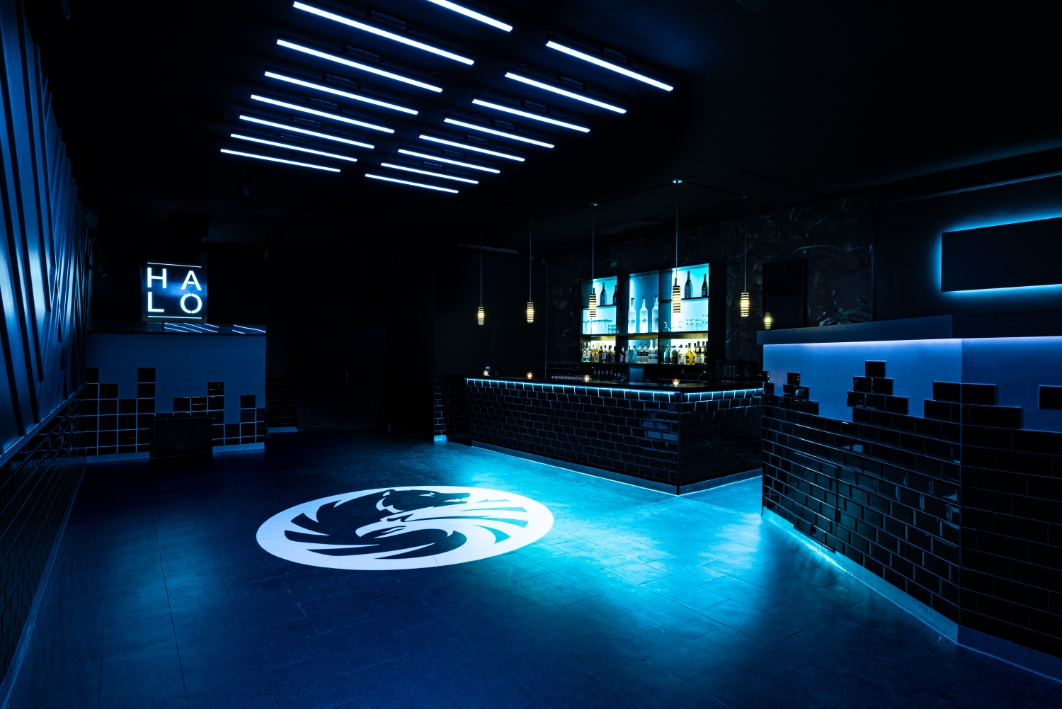 UPPER HALO Bar and Dancefloor with urban design elements such as bricks and some nice contemporary patterns on the walls add nice detail to the hip-hop area.